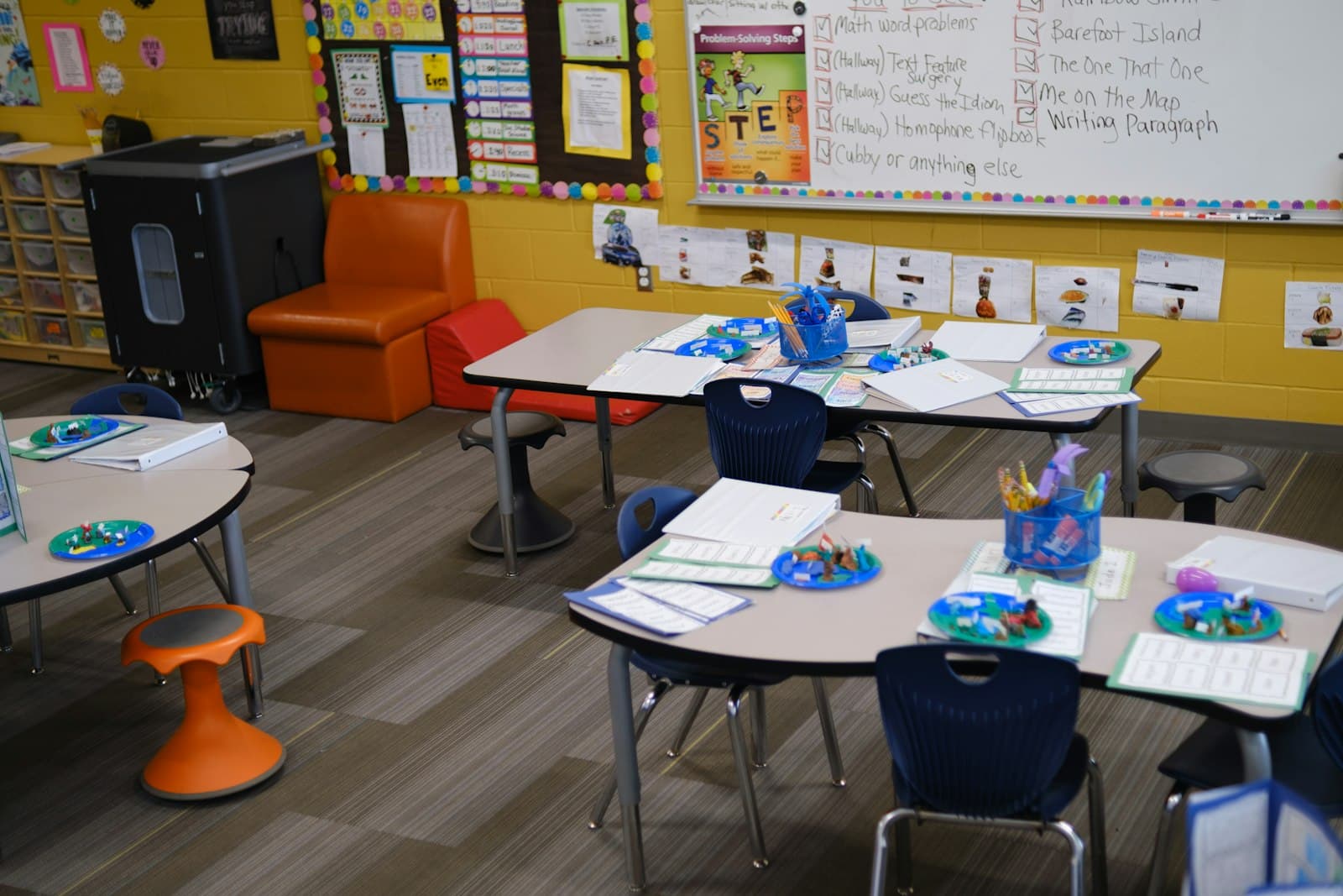 Classroom tables set up with materials