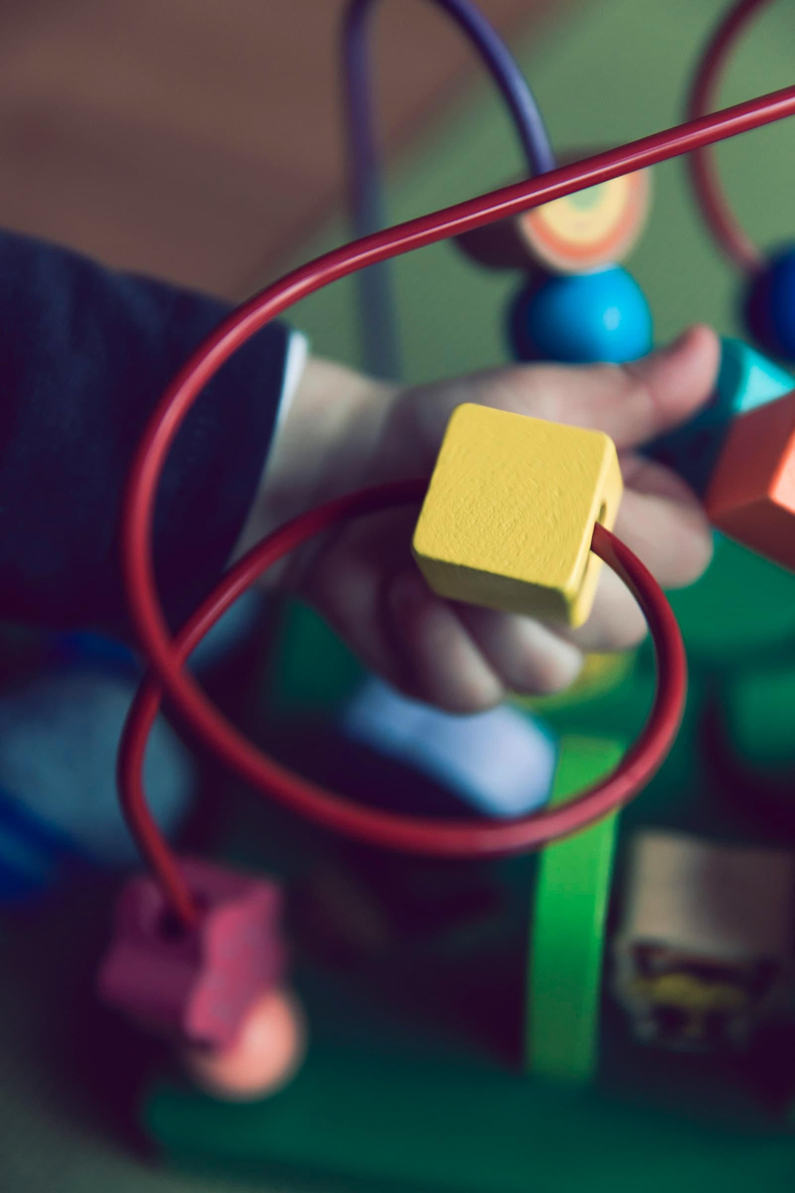 Close-up of an activity cube for infants