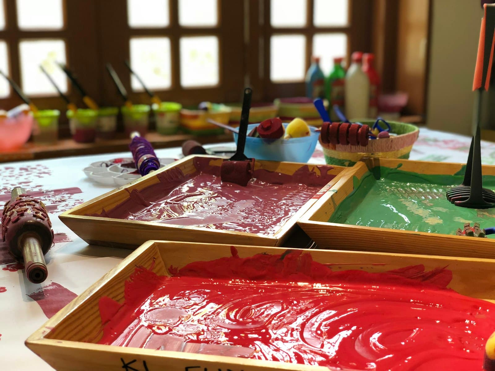 Trays of paint ready for a process art activity